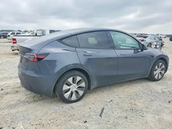 7SAYGDEE1NA005548 — 2022 Tesla Model Y, photo 3 from Copart, Side