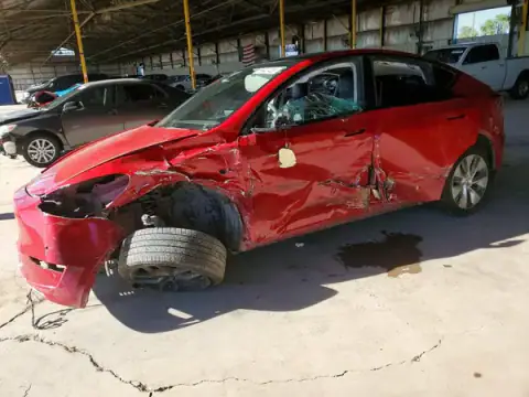7SAYGDEE3NF414511 Tesla Model Y 2022 — daño Lateral, foto antes de reparar