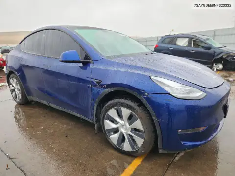 7SAYGDEE8NF323332 — 2022 Tesla Model Y, photo 4 from Copart, Side