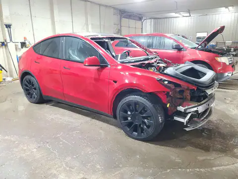 7SAYGAEE1NF364528 — 2022 Tesla Model Y, photo 4 from Copart, Side