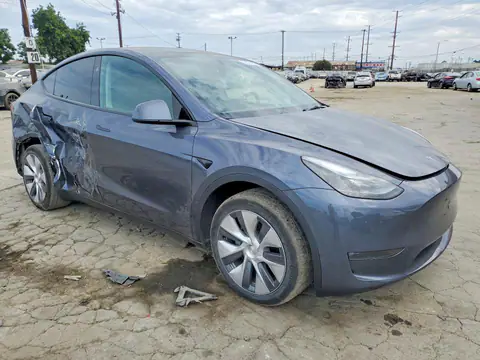 7SAYGDEE4PA167483 — 2023 Tesla Model Y, фото 4 з Copart 26.10.2026, Бокова частина