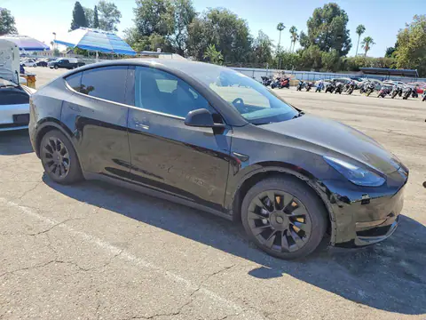 7SAYGAEE0PF634853 — 2023 Tesla Model Y, photo 4 from Copart 16.10.2026, Side