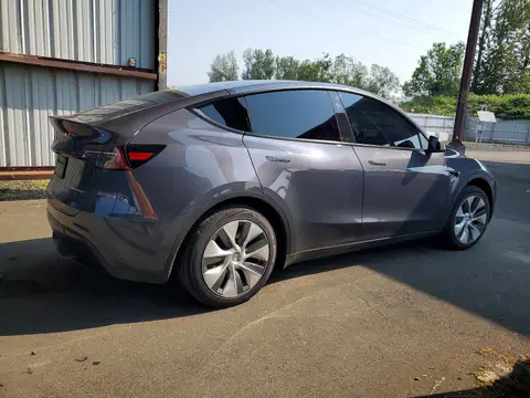 7SAYGAEE2PF909042 — 2023 Tesla Model Y, ფოტო 3, Copart 26.10.2026, გვერდითი ნაწილი