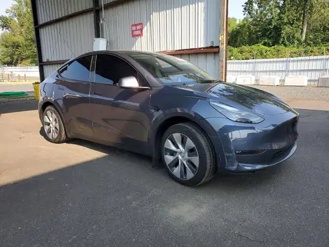 7SAYGAEE2PF909042 — 2023 Tesla Model Y, ფოტო 4, Copart 26.10.2026, გვერდითი ნაწილი