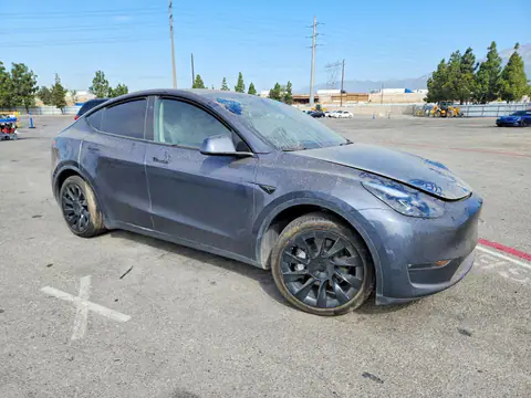 7SAYGDEE9PF960426 — 2023 Tesla Model Y, zdjęcie 4 z Copart 20.10.2026, Uszkodzenia dookoła