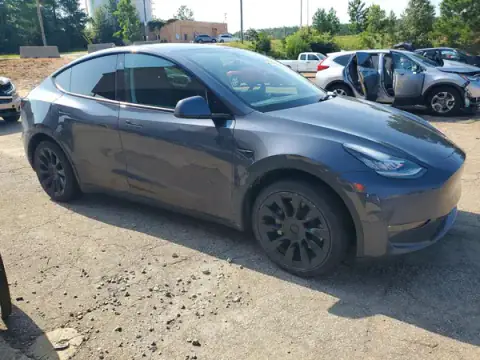 7SAYGDEE2PA027741 — 2023 Tesla Model Y, foto 4 de Copart 29.09.2026, Lateral
