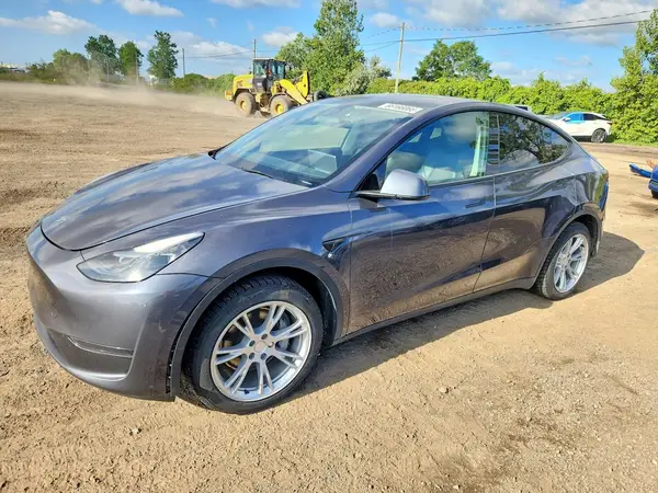 LRWYGDFD6PC221138 — 2023 Tesla Model Y, Боковая часть (Side), фото до ремонта