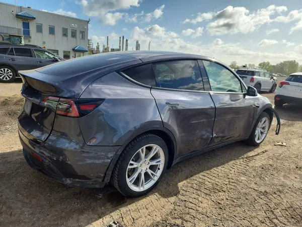 LRWYGDFD6PC221138 — 2023 Tesla Model Y, фото 3 с аукциона Copart 06.10.2026, Боковая часть