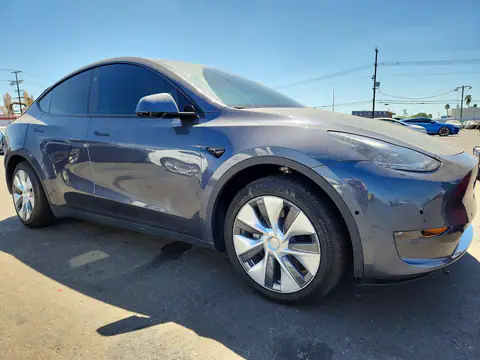 7SAYGDEDXPF949734 — 2023 Tesla Model Y, zdjęcie 4 z Copart 30.09.2026, Tył