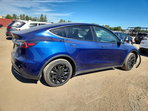 7SAYGAEE1PF706630 — 2023 Tesla Model Y, photo 3 from Copart 06.10.2026, Front end