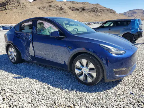 7SAYGAEE2PF945068 — 2023 Tesla Model Y, zdjęcie 4 z Copart 28.10.2026, Bok