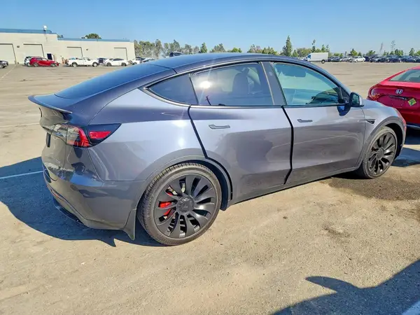 7SAYGDEF5PF874152 — 2023 Tesla Model Y, photo 3 from Copart, Minor dents and scratches