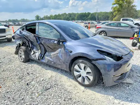 7SAYGDEE7PA201920 — 2023 Tesla Model Y, foto 4 de Copart, Lateral