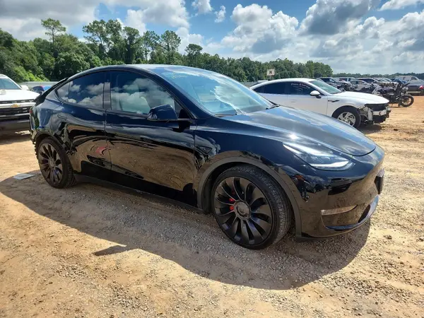 7SAYGDEF5PF870182 — 2023 Tesla Model Y, photo 4 from Copart, Rear end