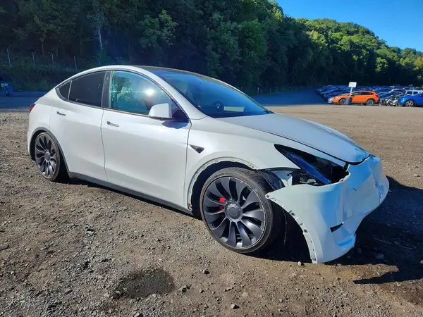 7SAYGDEF3PF773899 — 2023 Tesla Model Y, photo 4 from Copart, Front end
