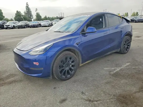 7SAYGDEE0PA168355 Tesla Model Y 2023 — Rear end damage, before-repair photo