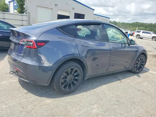 7SAYGDEE7PF747099 — 2023 Tesla Model Y, фото 3 с аукциона Copart, Боковая часть