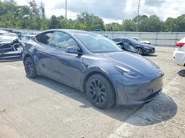7SAYGDEE7PF747099 — 2023 Tesla Model Y, фото 4 с аукциона Copart, Боковая часть