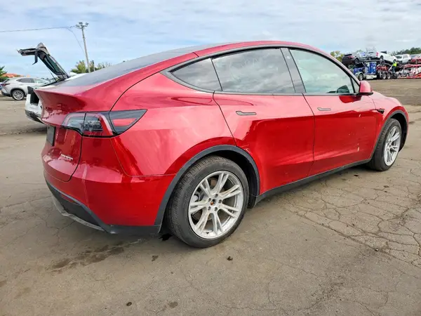 7SAYGDEE5PA107048 — 2023 Tesla Model Y, photo 3 from Copart, Flood