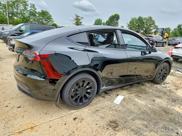 7SAYGAEEXPF605151 — 2023 Tesla Model Y, photo 3 from Copart, Side