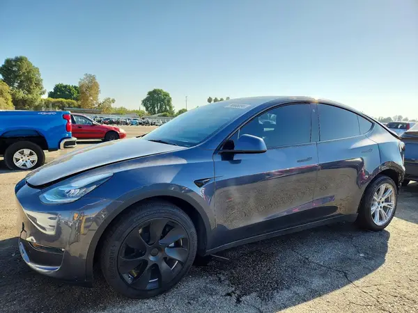 7SAYGDEE0PA035241 Tesla Model Y 2023 — Rear end damage, before-repair photo