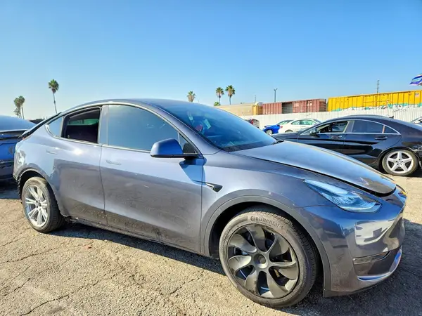 7SAYGDEE0PA035241 — 2023 Tesla Model Y, photo 4 from Copart, Rear end