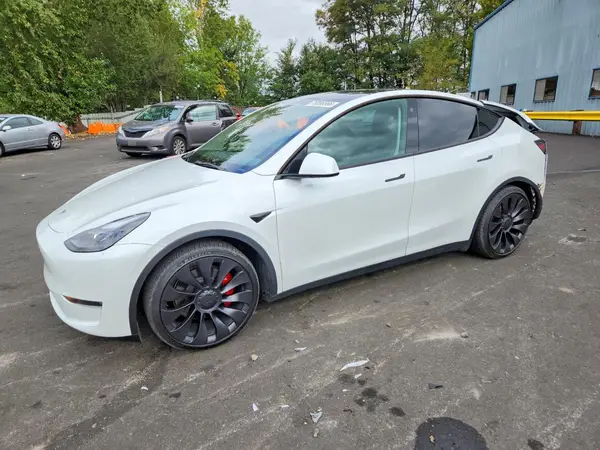 7SAYGDEF7PF778085 Tesla Model Y 2023 — Rear end damage, before-repair photo