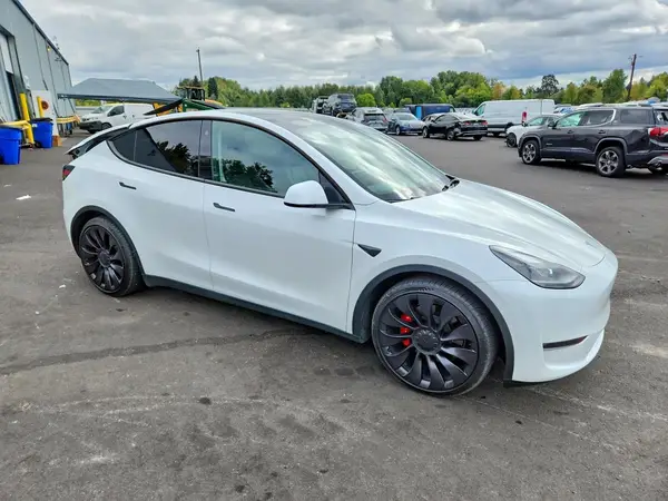 7SAYGDEF7PF778085 — 2023 Tesla Model Y, photo 4 from Copart, Rear end