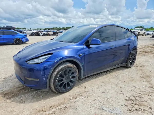 7SAYGDEE5PA100262 Tesla Model Y 2023 — Rear end damage, before-repair photo