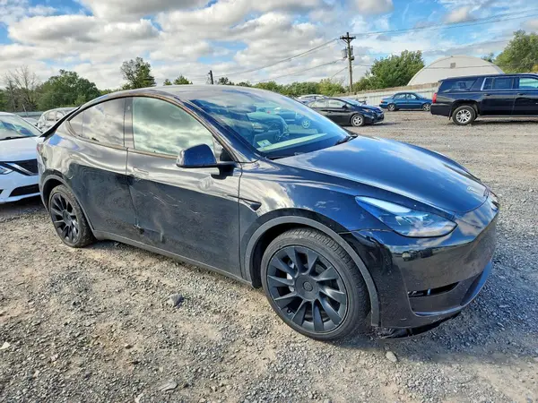 7SAYGDEE7PF760225 — 2023 Tesla Model Y, photo 4 from Copart, Rear end