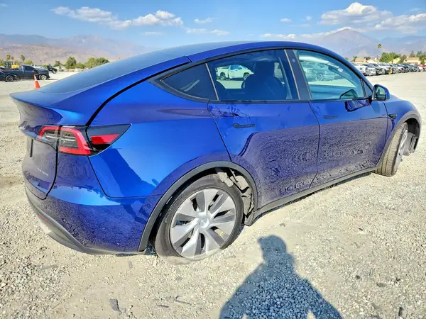 7SAYGAEE4PF615495 — 2023 Tesla Model Y, photo 3 from Copart, Undercarriage damage