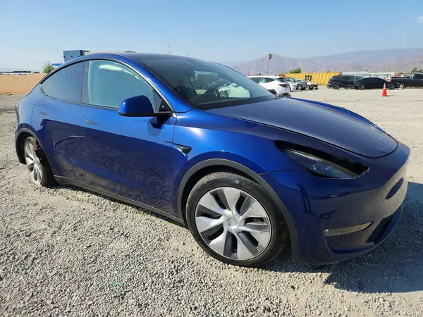 7SAYGAEE4PF615495 — 2023 Tesla Model Y, photo 4 from Copart, Undercarriage damage