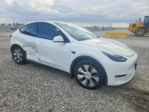 7SAYGDEE5PF843779 — 2023 Tesla Model Y, zdjęcie 4 z Copart, Bok