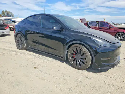 2023 Tesla Model Y VIN 7SAYGDEFXPF702988 фото 4