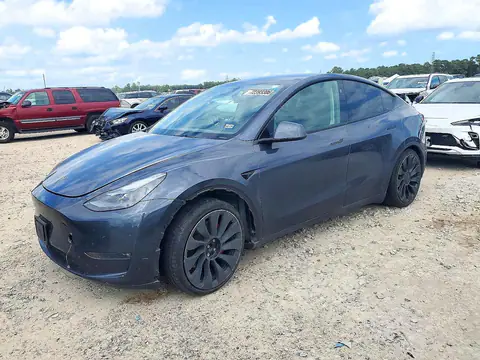 7SAYGDEF4PF789948 — 2023 Tesla Model Y, Lateral, fotos antes de reparar