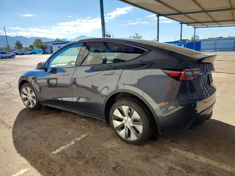 7SAYGDEE3PF853050 — 2023 Tesla Model Y, фото 2 з Copart, Бокова частина