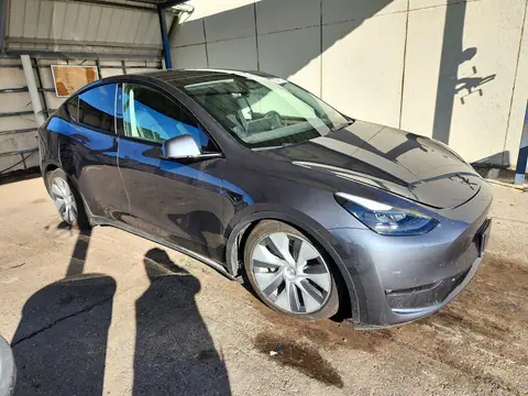 7SAYGDEE3PF853050 — 2023 Tesla Model Y, фото 4 з Copart, Бокова частина