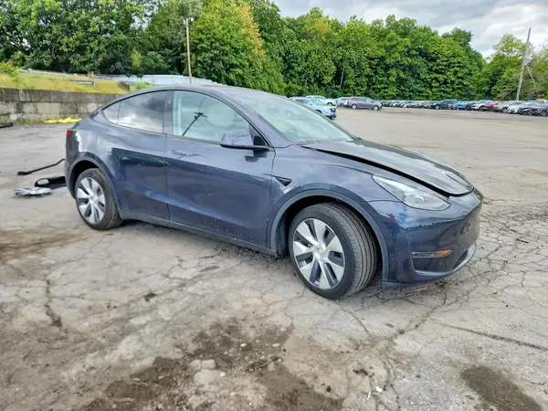 7SAYGDEE7RA222060 — 2024 Tesla Model Y, photo 4 from Copart, Front end