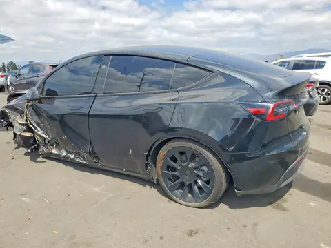 2025 Tesla Model Y VIN 7SAYGDED7SF219854 фото 2