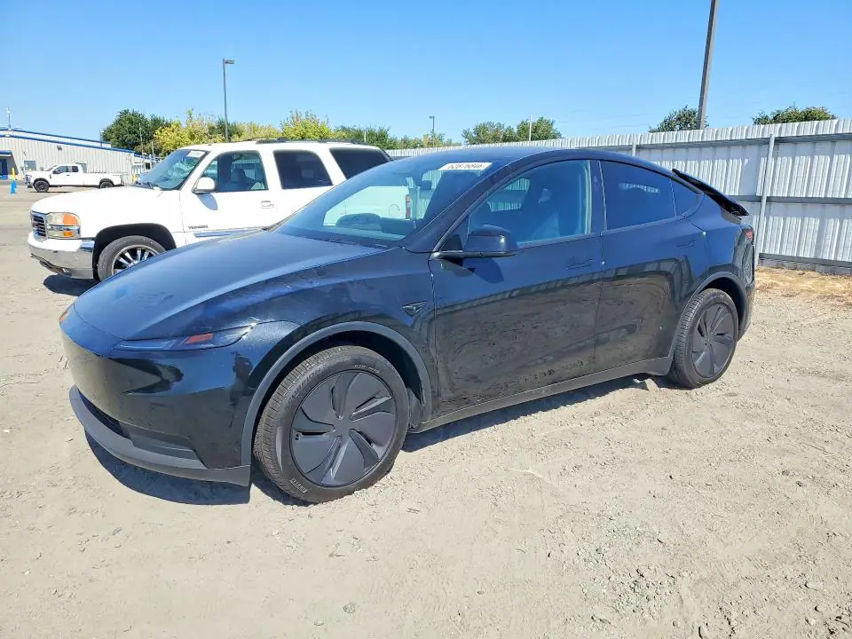7SAYGDED9TA712336 Tesla Model Y 2026 — Rear end damage, before-repair photo