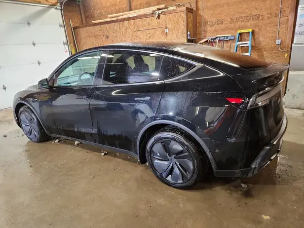 7SAYGDEE9TA672235 — 2026 Tesla Model Y, фото 2 з Copart, Бокова частина