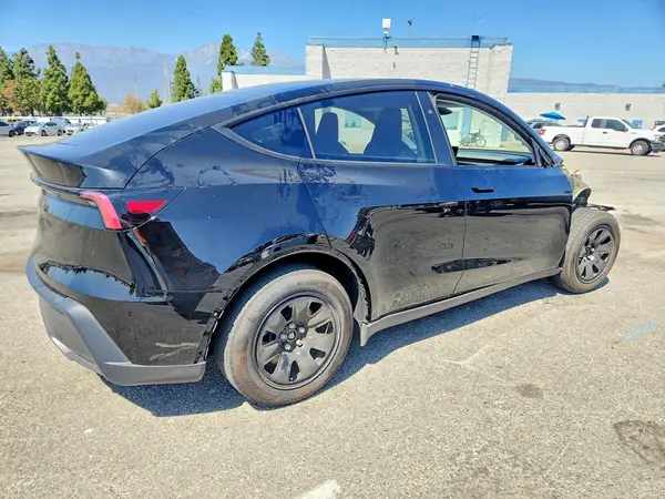 7SAYGDED0TA604817 — 2026 Tesla Model Y, photo 3 from Copart, Front end