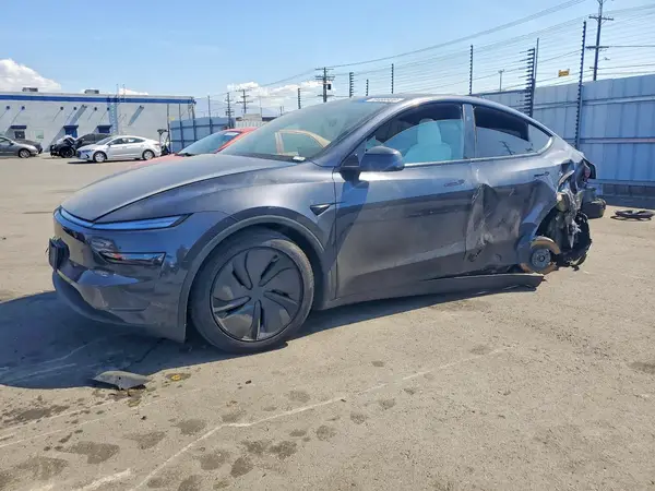 7SAYGDED1TF647355 Tesla Model Y 2026 — Rear end damage, before-repair photo