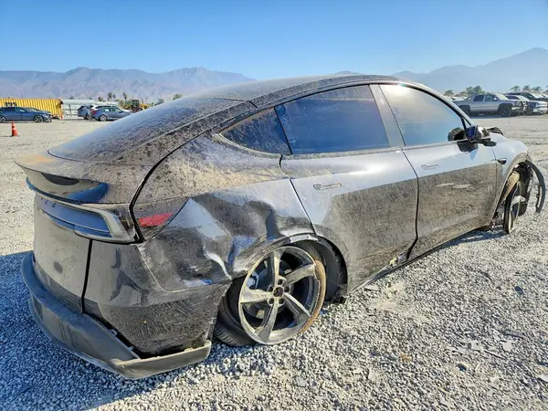 7SAYGDED0TF621877 — 2026 Tesla Model Y, photo 3 from Copart, Rollover