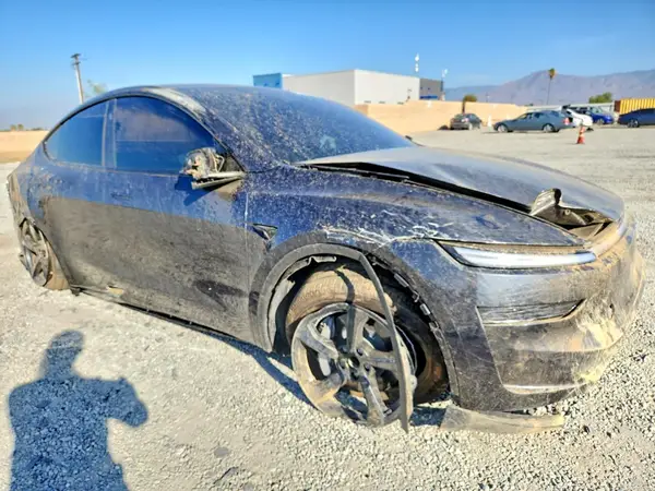 7SAYGDED0TF621877 — 2026 Tesla Model Y, photo 4 from Copart, Rollover