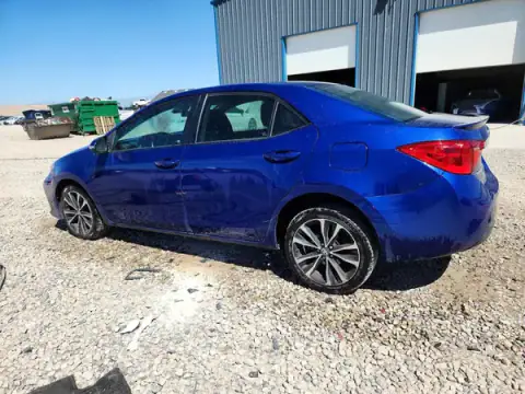 2T1BURHE9HC941983 — 2017 Toyota Corolla, photo 2 from Copart, Side