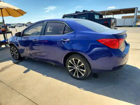 2T1BURHE8HC767923 — 2017 Toyota Corolla, foto 2 de Copart 24.09.2026, Lateral