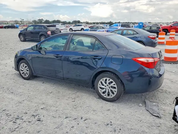 2T1BURHE4HC882289 — 2017 Toyota Corolla, photo 2 from Copart 02.10.2026, Side