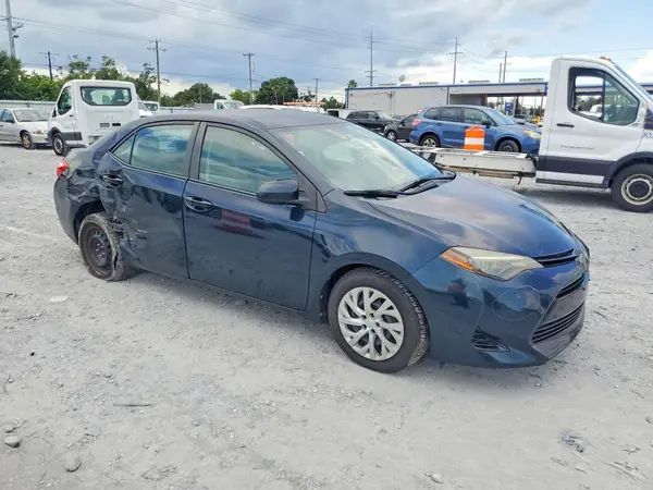 2T1BURHE4HC882289 — 2017 Toyota Corolla, photo 4 from Copart 02.10.2026, Side