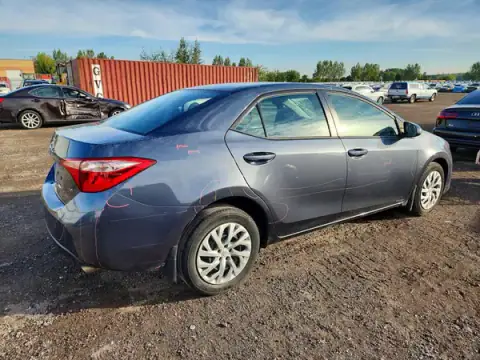 2T1BURHE2JC001174 — 2018 Toyota Corolla, zdjęcie 3 z Copart 01.10.2026, Grad